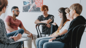 A group of young people getting learning support.